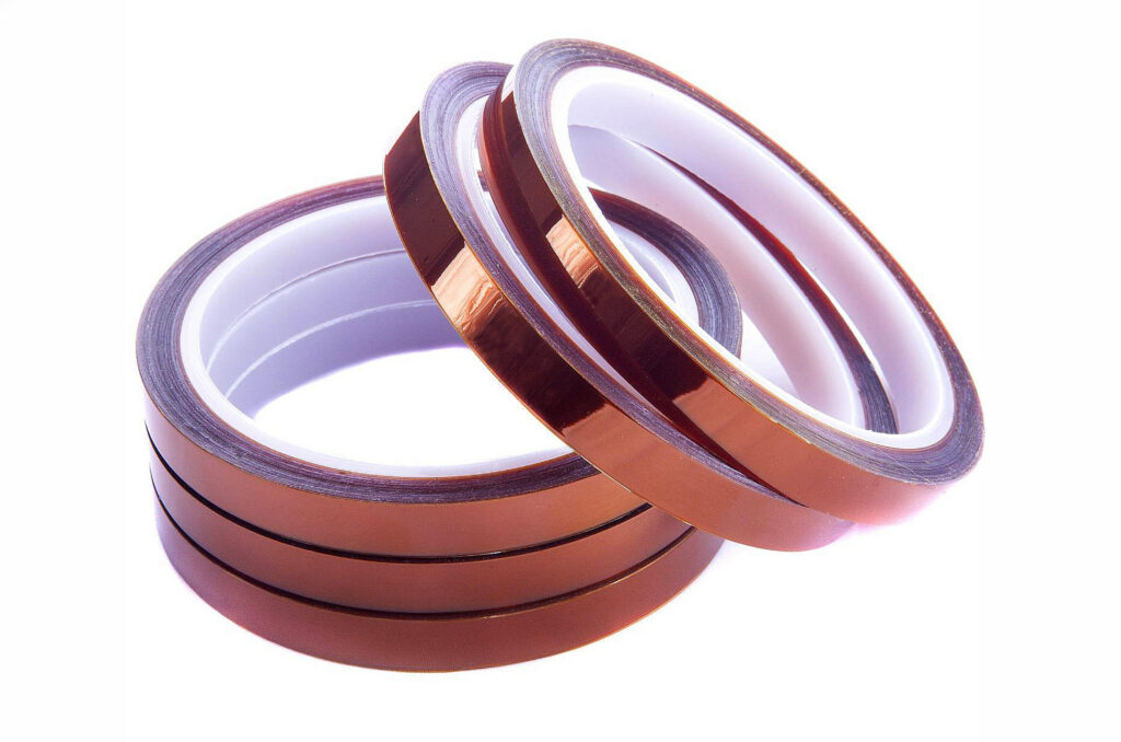 Image of 5 Bronze color specialty tapes.